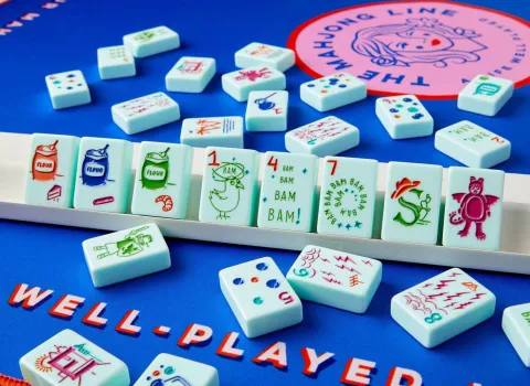 Mahjong titles on blue table cloth