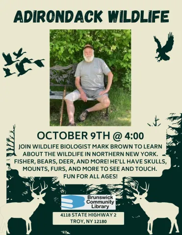 Flyer shows image of male presenter sitting on a bench in the woods.