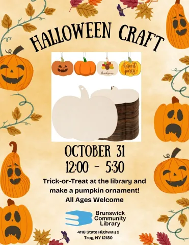 Image of wood pumpkin ornament craft with clipart of jack-o-lanterns