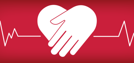Heart with hands performing CPR